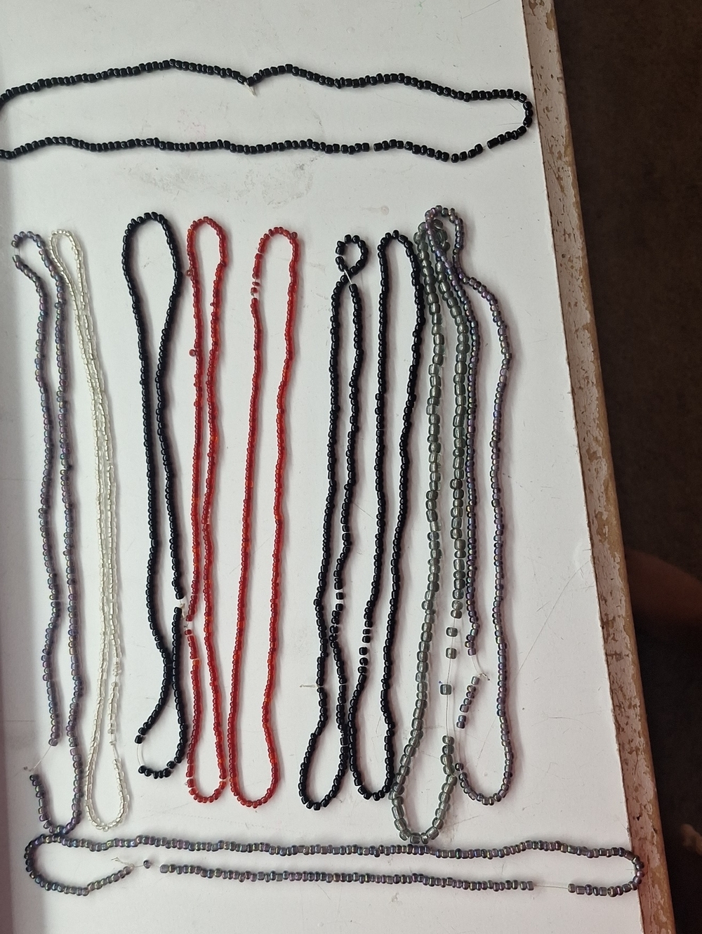 Beads. Just Cut The String And You Get A Whole Buntch Of Beads.